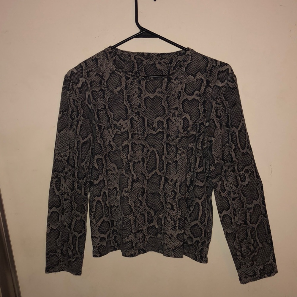 Long sleeved snake print top